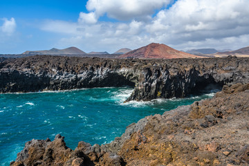 Fototapeta na wymiar Volcanic Coastal Landscape in Los Hervideros in Lanzarote, Spain