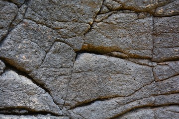 Granit Fels Naturstein wand, Gartenmauer mit Mauersteinen als Hintergrund.
