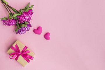 Pink flowers and red hearts, gift box
