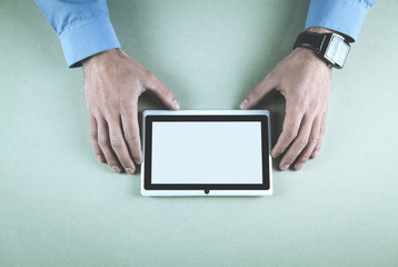 Man showing white digital tablet.