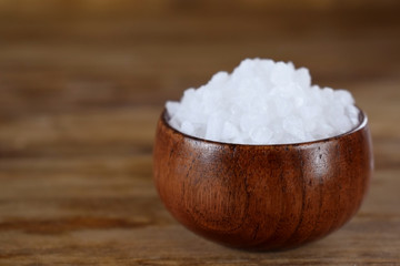 Big sea salt in a wooden bowl