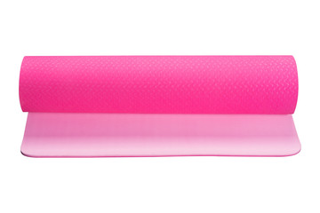 pink fitness mat or for yoga, a roll is slightly unwound, on a white background isolated