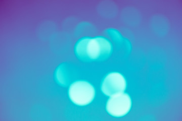 festive, blurry bokeh blue, pink bright dots lilac