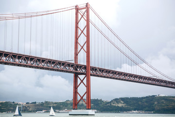 Bridge called April 25 in Lisbon in Portugal against the sky