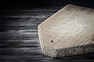 Wooden cutting board on the kitchen vintage table