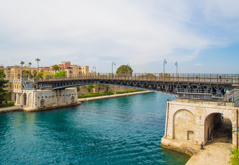 Fototapeta premium Taranto (Italy) - The historic center of a big city in southern Italy, Puglia region, on the sea with industry port, in a spring day.