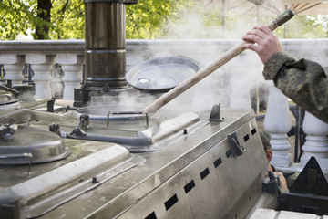 cooking in the field military kitchen, kitchen during the fighting