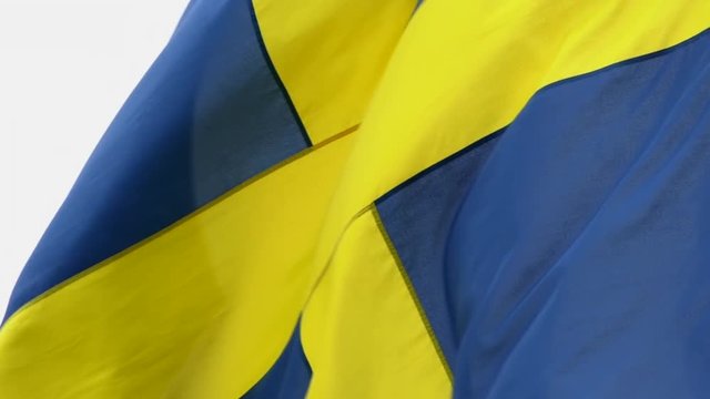 The swedish flag flapping in slow motion