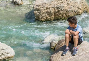 The moment of meditation on the banks of the stream    