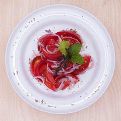 Salad with tomato and onion appetizer