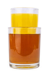 Two glasses of fresh orange and apple juice isolate