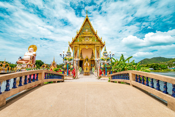 Fototapeta na wymiar Wat Plai Laem Buddhism Temple statues during a bright sunny day in Koh Samui, Surat Thani, Thailand 