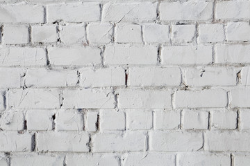 Fototapeta premium White brick wall, perfect as a background, square photograph