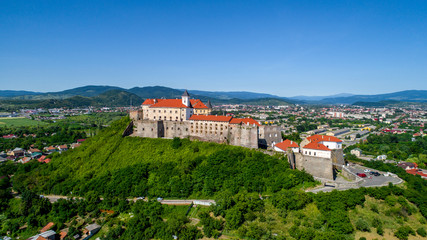 Fototapeta na wymiar Beautiful panoramic aerial view to Palanok Castle in the city of Mukachevo.