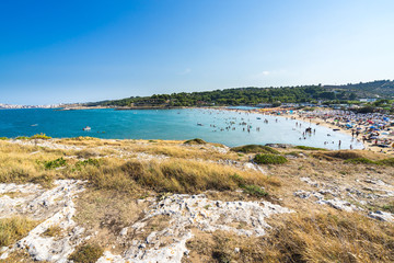 Molinella beach during summer. Molinella is a popular beach Vieste, one of the most beautiful town in Gargano, Apulia, Italy