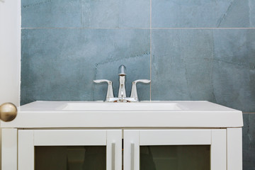 Granite modern bathroom interior with minimalist washbasin and bathtub