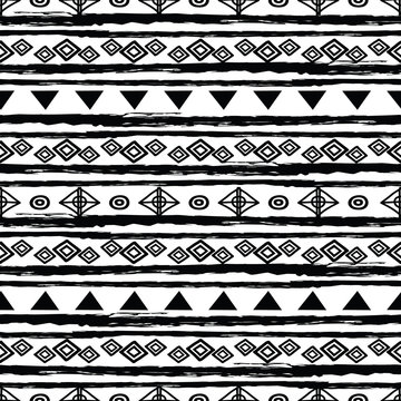 Black and white tribal seamless repeat pattern. Great for folk modern wallpaper, backgrounds, invitations, packaging design projects. Surface pattern design.