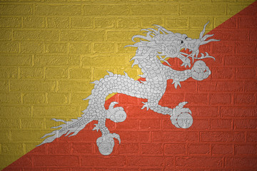 Flag of Bhutan on brick wall background, 3d illustration