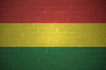 Flag of Bolivia on brick wall background, 3d illustration