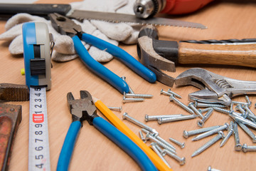 Construction Tools On Wooden Desk