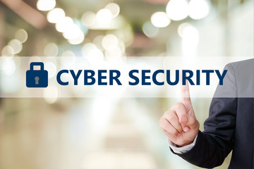 Businessman hand touching cyber security device screen over blur background, banner, cyber security concept