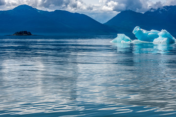 Iceberg Floating in the Calm Waters of Alaska