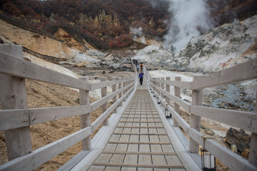 Jigokudani or Hell Valley in the town of Noboribetsu Onsen, hot steam vents, sulfurous streams and...