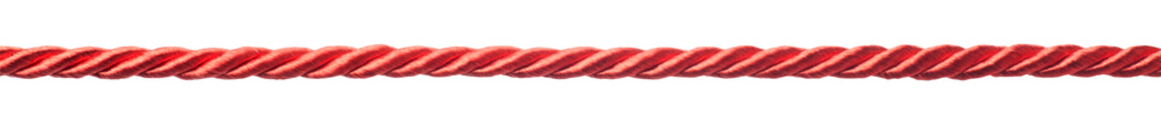Red rope isolated on white background © koosen