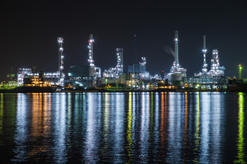 Naklejka premium oil refinery industry plant along twilight morning. View gas processing factory. gas and oil industry.