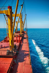 Cargo Ship Sailing in High Sea