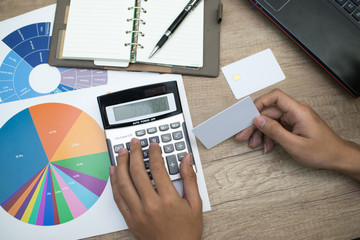 Businessman hand working with finances