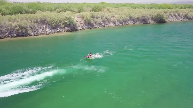 Inner Tubing Behind Boat