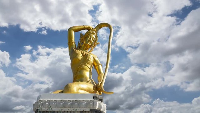 The large gold statue of Phra Mae Thorani is built on the belief of Southeast Asia in Thailand. timelapse