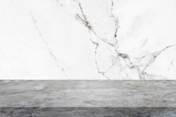 Polishing cement table top and background of white marble stone wall - can used for display or...