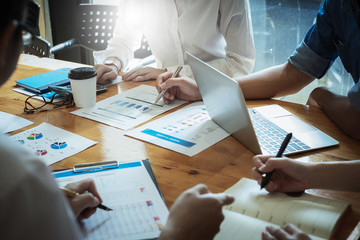 Business team Discussing and brainstorm idea about marketing at casual meeting room . Business consult concept.