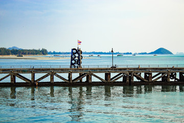 The fishing pier and ferry boats. On the island.
