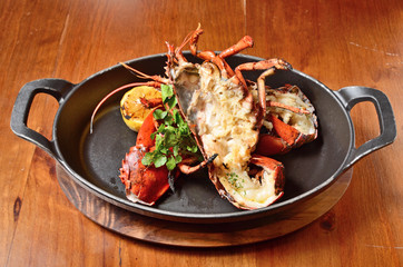 Delicious roasted lobster dinner with  fresh herbs