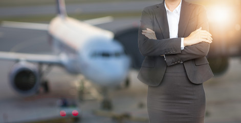Double exposure of Business people checking time on Airport background.