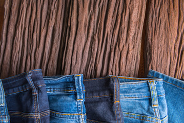 blue jeans , Pocket detail on wooden board