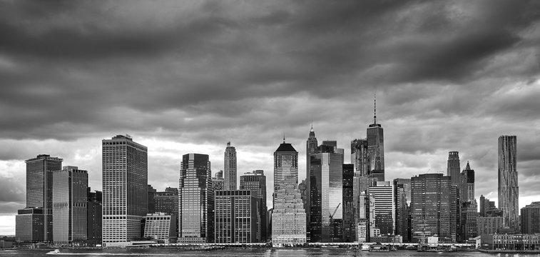 Black and white Manhattan panoramic picture with stormy sky, New York City, USA. 