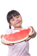 asian child eat watermelon