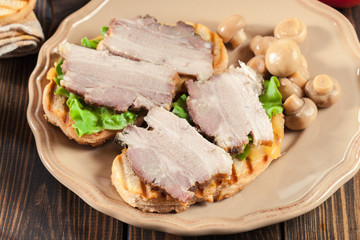 Sandwich with baked pork belly