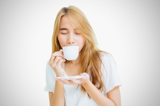girl teen holding coffee cup to drinking coffee on white background