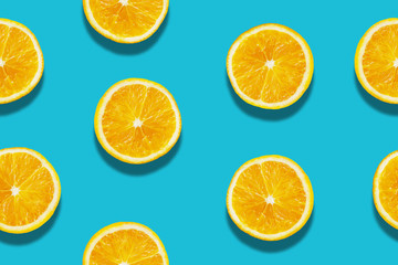 Orange fruit patterns seamless flatlay on blue background illustration