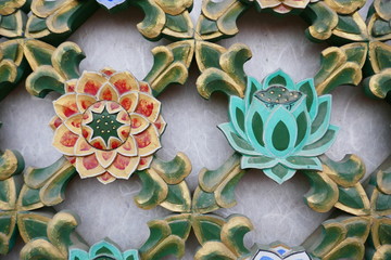 Detail of a door showing carved and painted lotus and hanji paper. Daeseongsa Temple, Seoul, South...