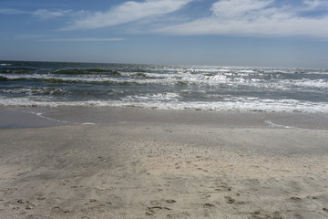 Obraz premium Landscape with The Black sea, sand and beach elements