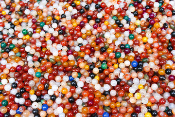 Photo pattern closeup. Stones for jewelry. Small beads