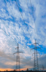 Power Line. pylon against a blue sky