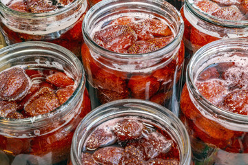 Strawberry jam in glass jars