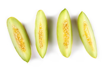 Fresh cantaloupe melon slices isolated on white background, top view